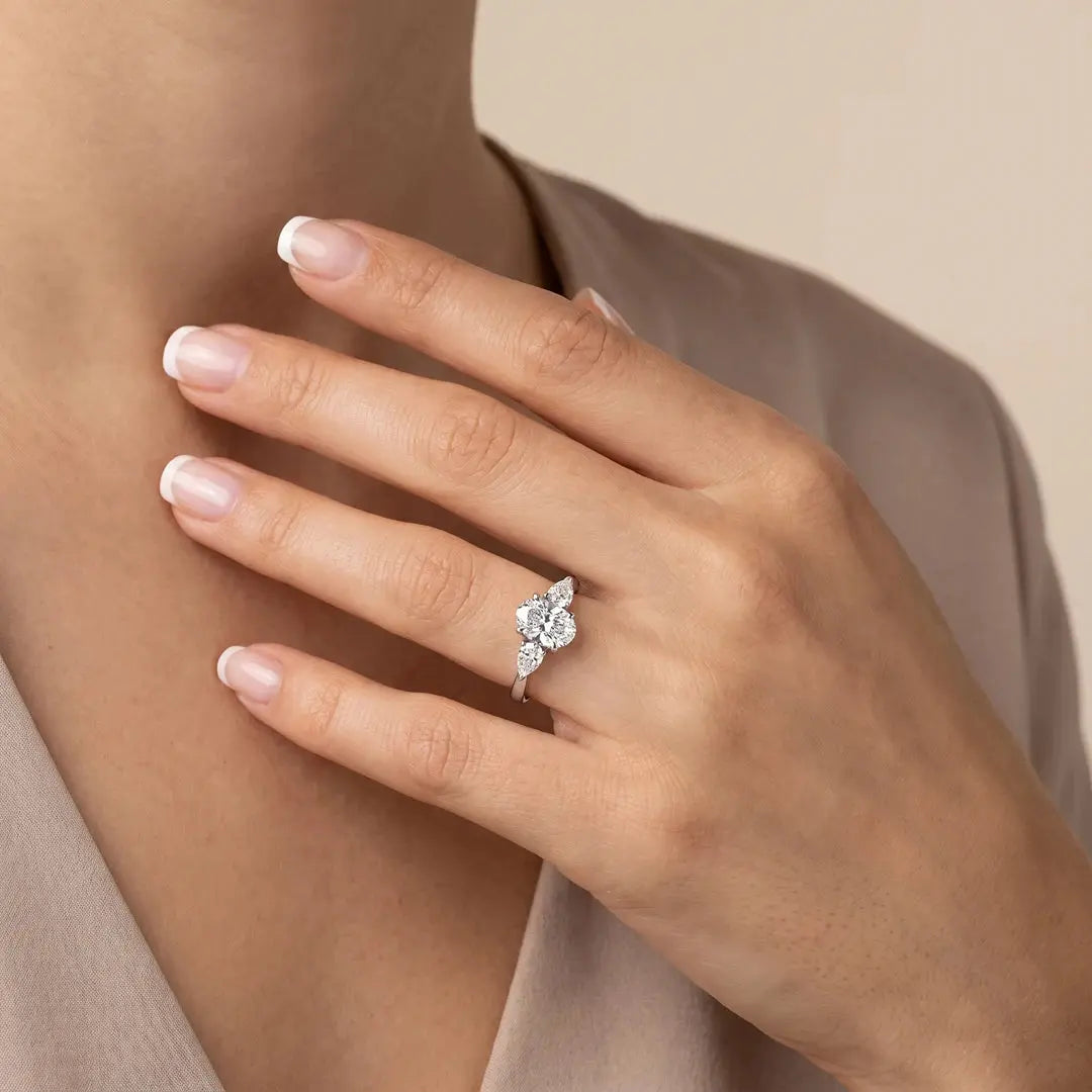 2.20 CT Oval & Pear Three Stone Diamond Ring