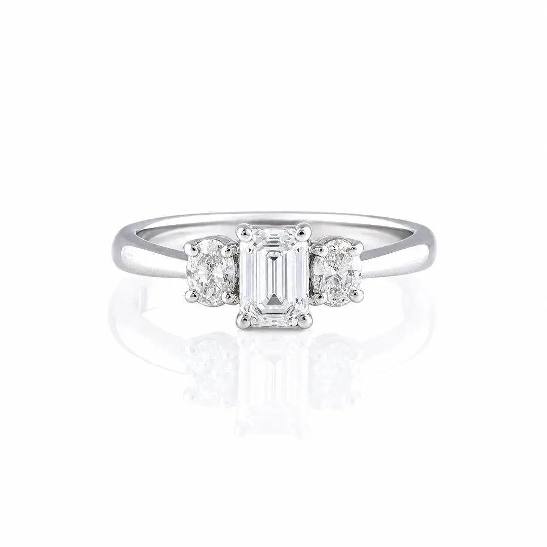 1.05 CT Emerald & Oval Three Stone Diamond Ring