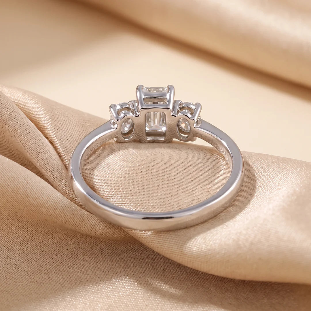 1.05 CT Emerald & Oval Three Stone Diamond Ring