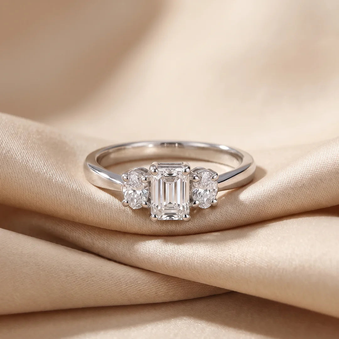 1.05 CT Emerald & Oval Three Stone Diamond Ring
