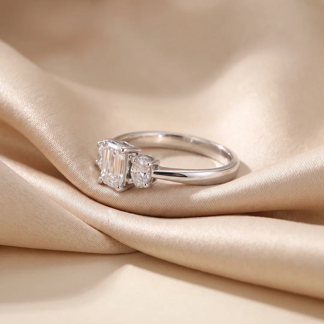 1.05 CT Emerald & Oval Three Stone Diamond Ring