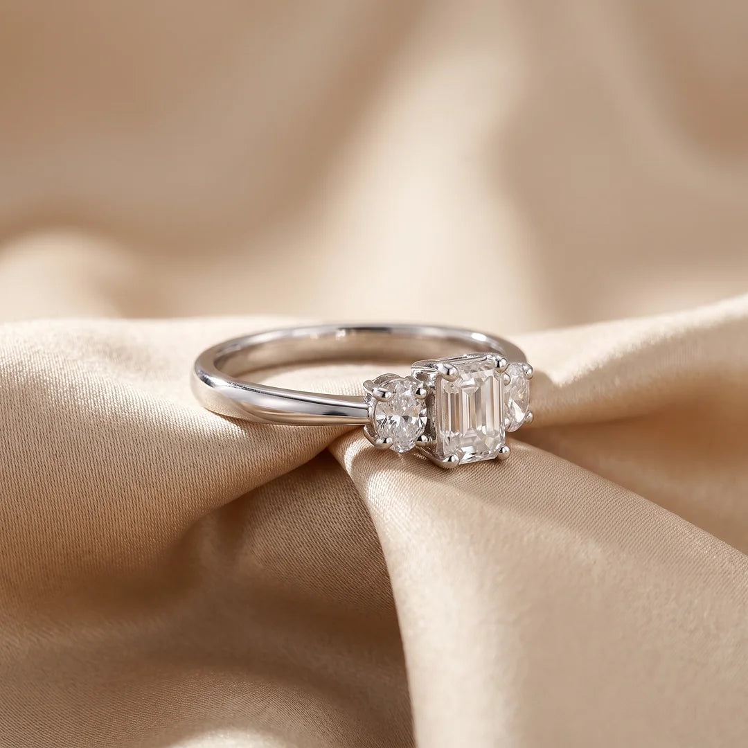 1.05 CT Emerald & Oval Three Stone Diamond Ring