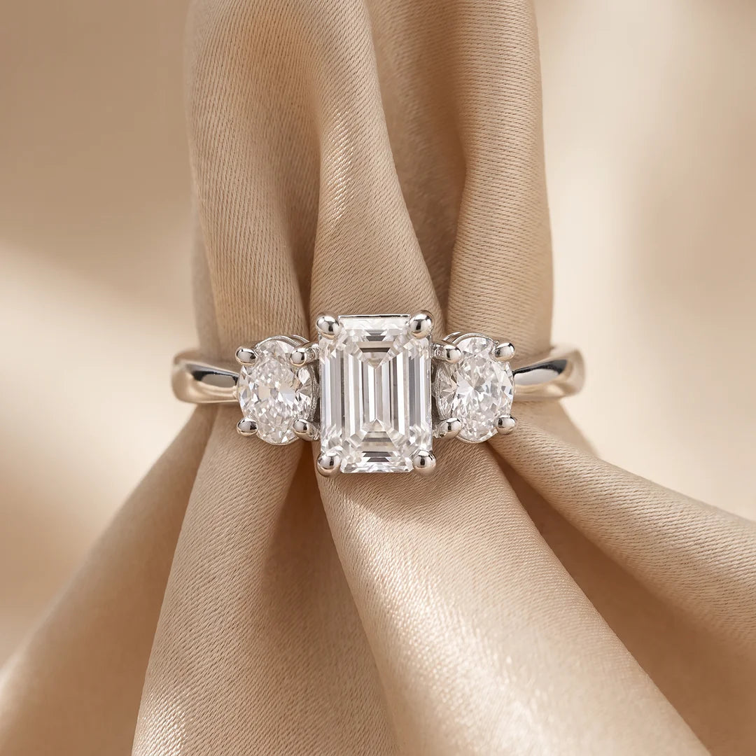 1.05 CT Emerald & Oval Three Stone Diamond Ring
