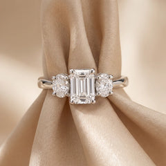 1.05 CT Emerald & Oval Three Stone Diamond Ring