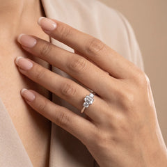 1.05 CT Emerald & Oval Three Stone Diamond Ring