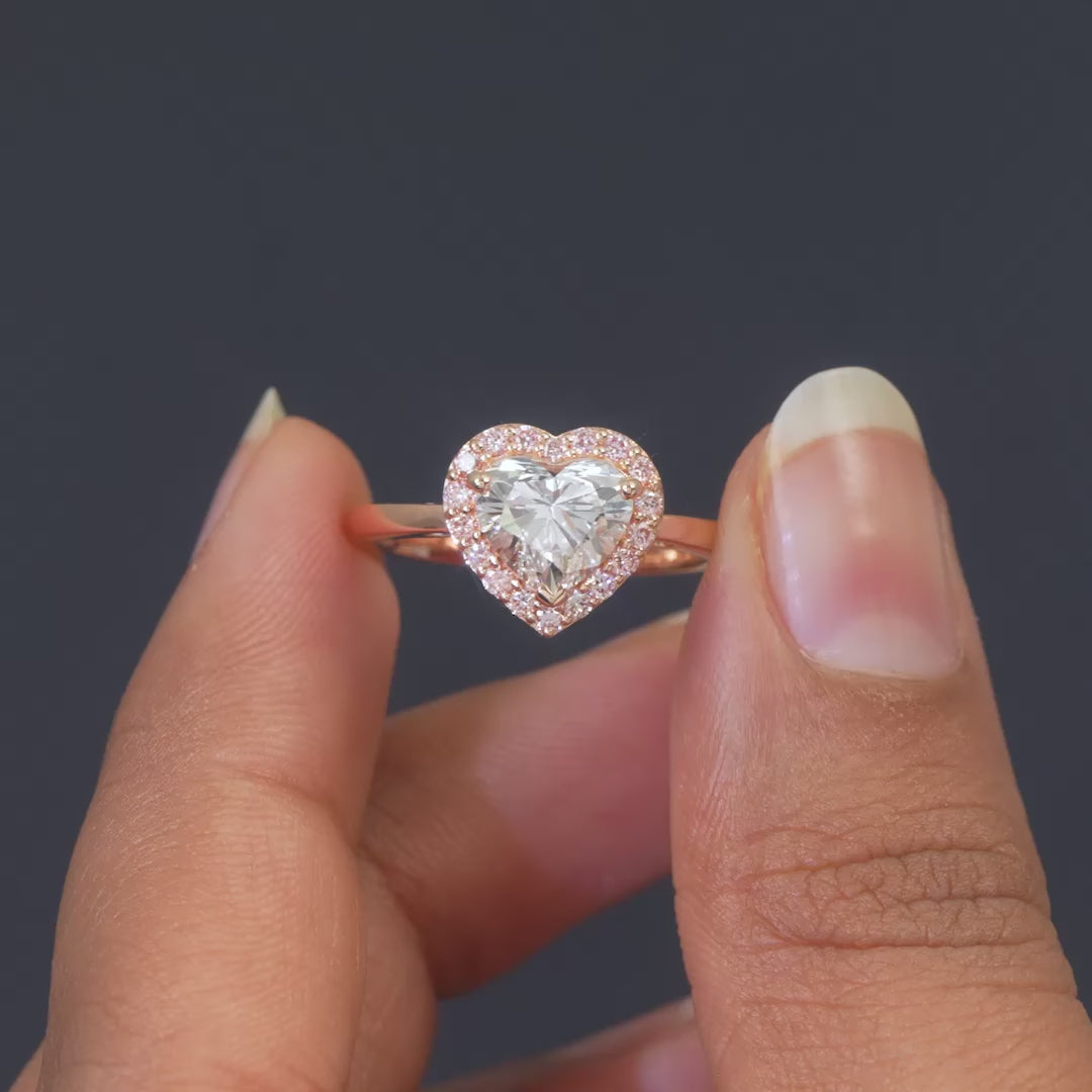Hand shot video of 1.70 CT Heart Cut Pink Diamond Halo Ring